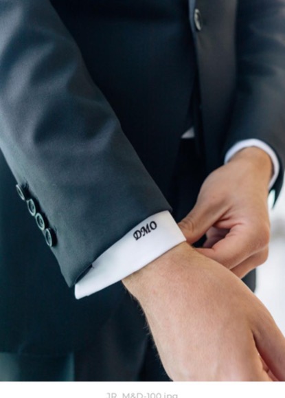 Oliel monogram embroidered on a shirt cuff