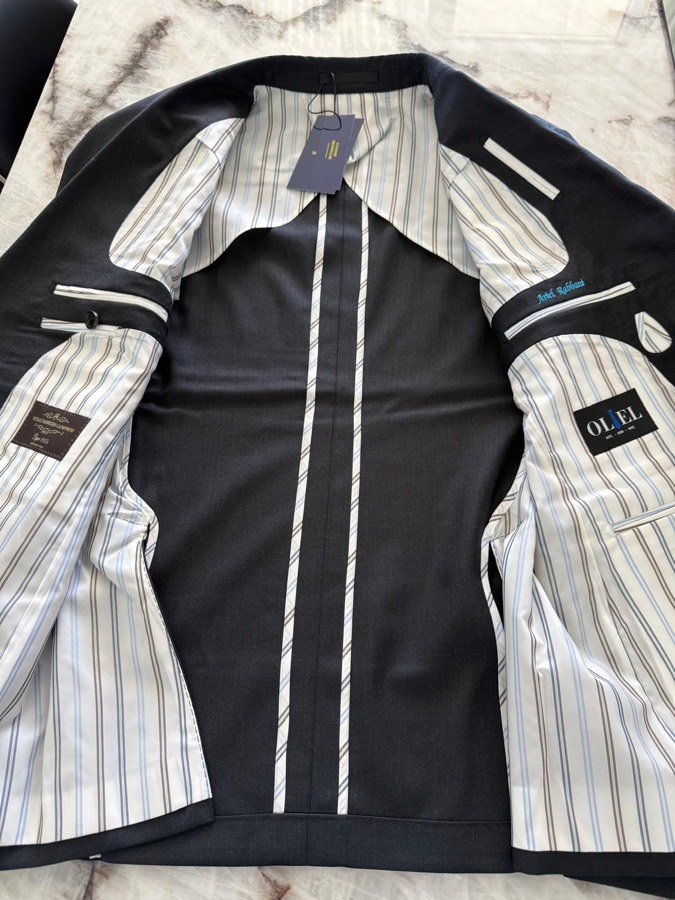 Bespoke striped lining with personalised Oliel name label
