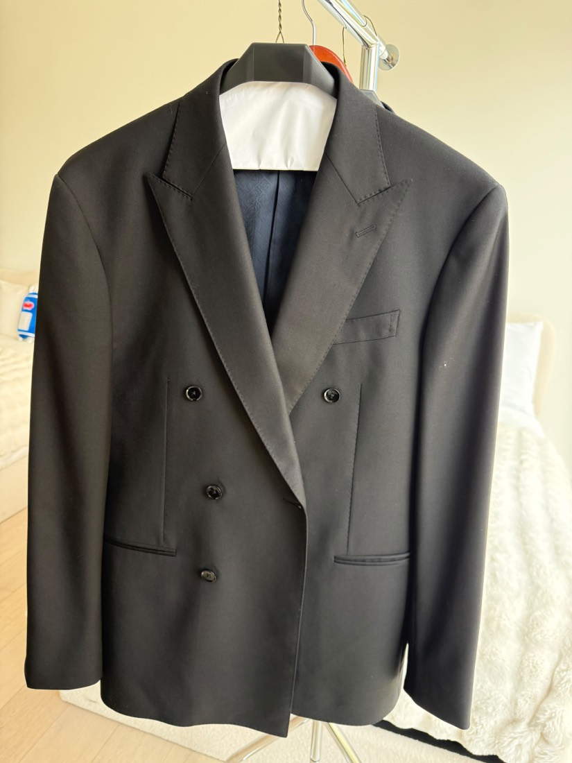 Black double-breasted bespoke suit